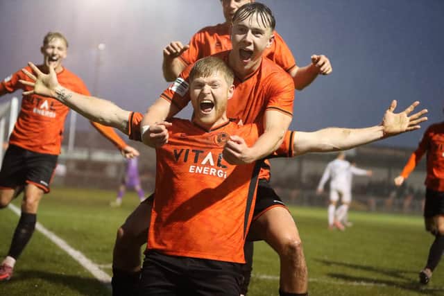 Elliott Whitehouse celebrates a goal for Peterborough Sports against Radcliffe. Photo Darren Wiles