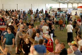 Customers enjoy the tastes of the Peterborough Beer Festival