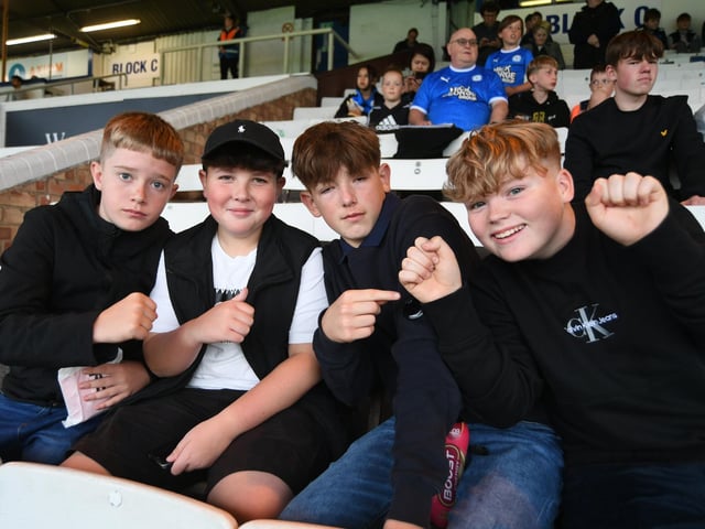 Fans enjoy Posh beating Swindon Town on pens in the EFL Cup at the Weston Homes Stadium on 8th Aug 2023.