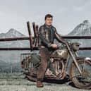 Terry Jones, who came up with the idea for the fundraiser, sitting astride his "dream bike" - a Second World War-era Matchless G3L WD (image: Dr David Roberts)