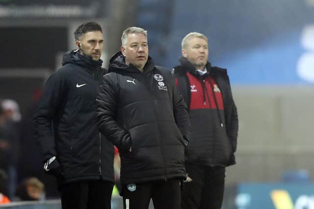 Peterborough United Manager Darren Ferguson alongside Doncaster Rovers Manager Grant McCann. Photo: Joe Dent.