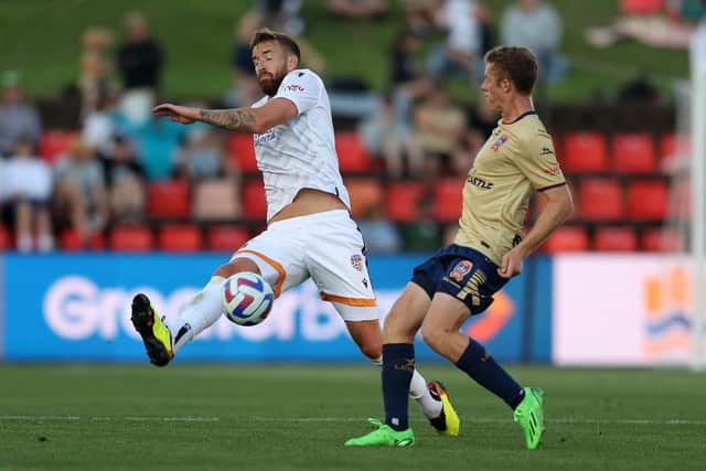 Mark Beevers (left) in action for Perth Glory. Photo by Scott Gardiner/Getty Images.