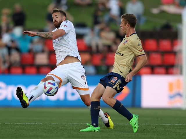 Mark Beevers (left) in action for Perth Glory. Photo by Scott Gardiner/Getty Images.