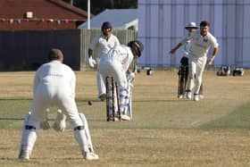 Nick Green takes a wicket for Peterborough Town during last weekend's ECB KO Cup defeat at the hands of Sutton CC. Photo Andy Dann.