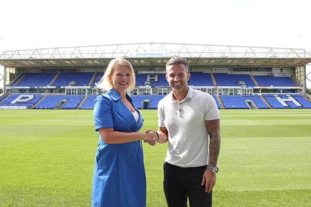 Selco Marketing Director Carine Jessamine with Alex Harris of Peterborough United.