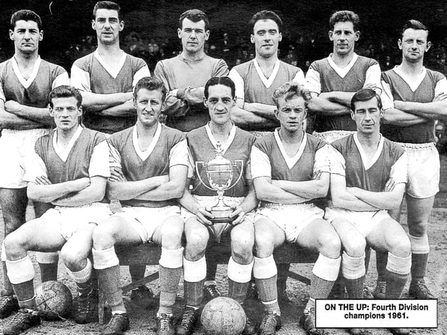Centre-back Rigby skippered the awesome Posh side that won the Fourth Division title in the club's first season as a Football League club. That team scored a club and league 134 goals in a single season. Rigby, who went on to manage Posh, is pictured with the trophy.