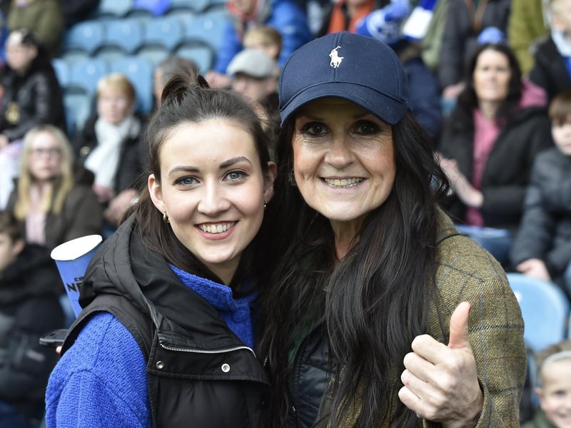 Peterborough United fans watch the defeat against Bolton Wanderers.