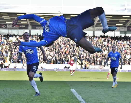 PT photographer David Lowndes brilliantly caught Nathanael Ogbeta flying through the air to celebrate his first Posh goal last weekend.