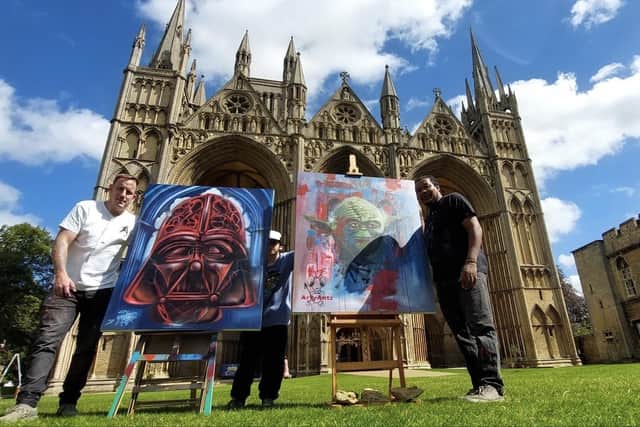 Nathan Murdoch (L) and Tony Nero produced their unique artworks as part of the Cathedral's 'Art Wars' event.