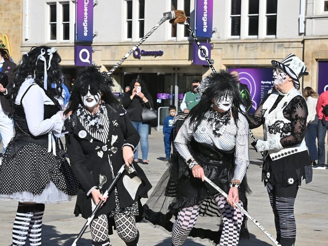 Pig Dyke Molly dancers perform in the sunshine
