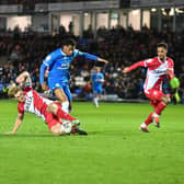 Carl Piergianni makes a tackle for Stevenage against Posh on Wednesday night. Photo David Lowndes.