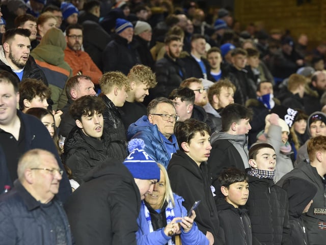 Peterborough United fans watch the 0-0 draw with Charlton Athletic.