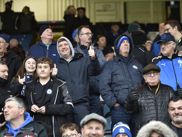 Peterborough United fans watch their side struggle to a 2-2 draw at home to Salford.