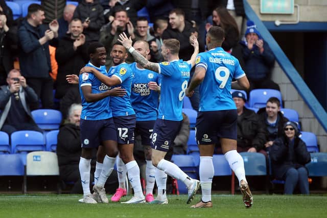 Posh celebrate scoring against Exeter. Photo: Joe Dent.