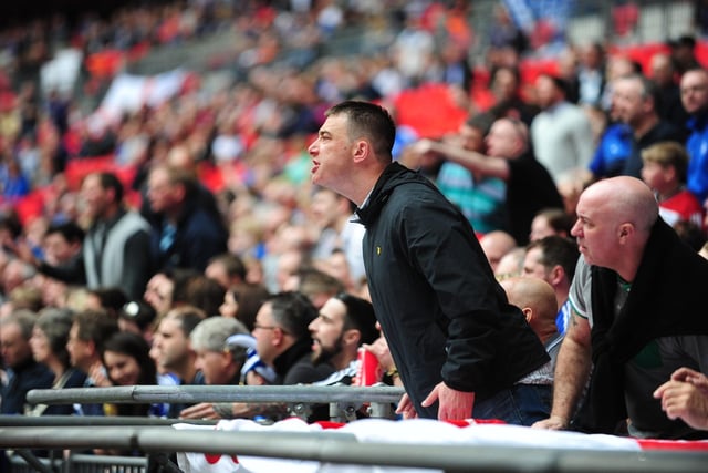 Peterborough United fans soak in the Wembley atmosphere in 2014.