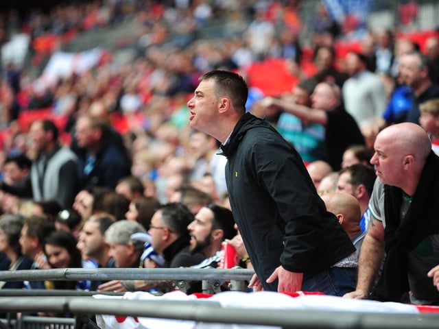 Peterborough United fans soak in the Wembley atmosphere in 2014.