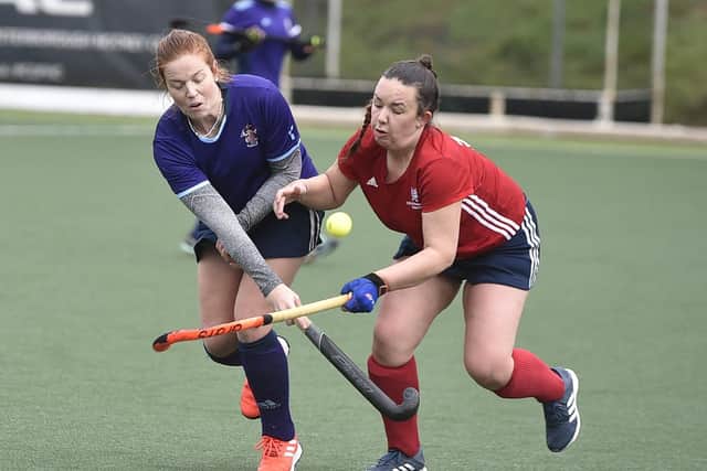 Action from City of Peterborough Ladies seconds (red) and Cambridge South. Photo: David Lowndes.