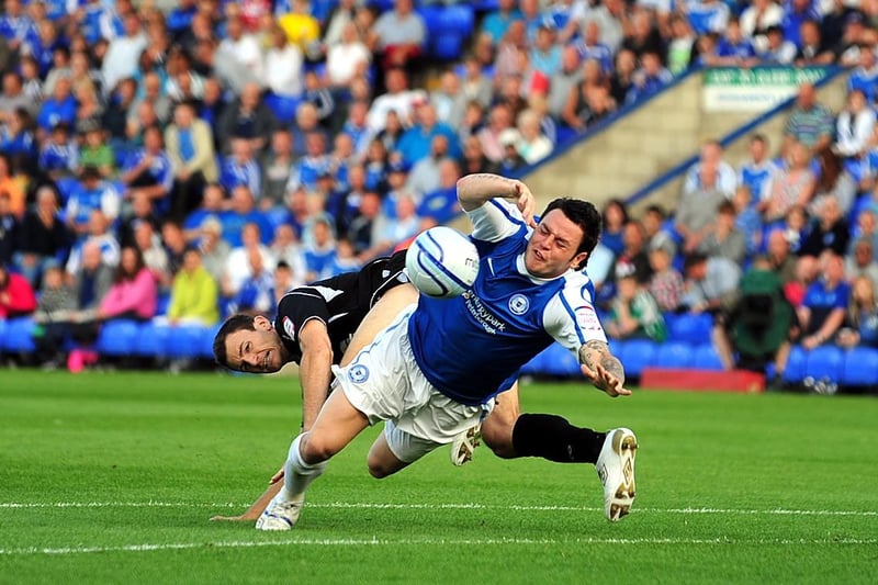 Posh actually fell behind in this Championship fixture at London Road in August, 2011, but romped to a huge win against a team reduced to nine men early in the second-half. Lee Tomlin, who is pictured winning a penalty, hit a hat-trick with Paul Taylor and Grant McCann scoring twice.