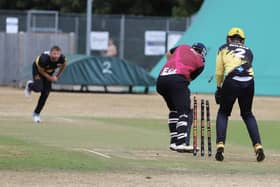 Jamie Smith takes a wicket for Peterborough Town against Kislingbury at Bretton Gate. Photo Andy Dann