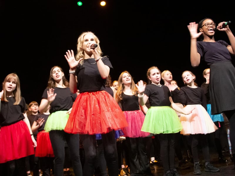 Rising Stars Musical Theatre Group on stage at the New Theatre with Showstoppers
