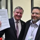 Cllr Leader Dennis Jones and Deputy Leader Mohammed Jamil presenting the budget statement to full council.