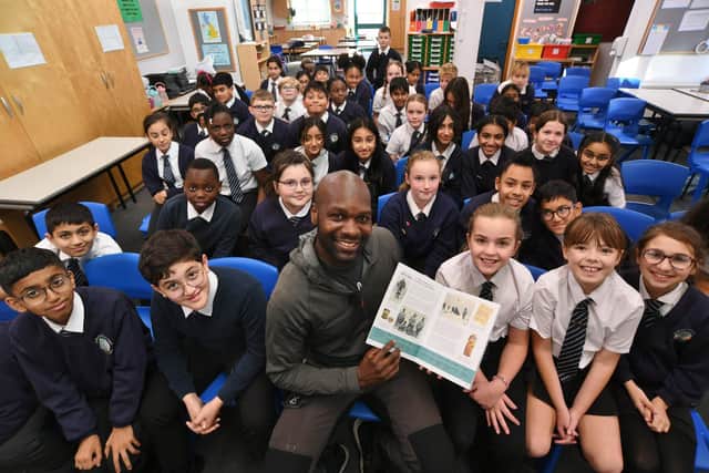 Polar explorer Dwayne Fields talking to year 6 pupils during a visit to Longthorpe primary school
