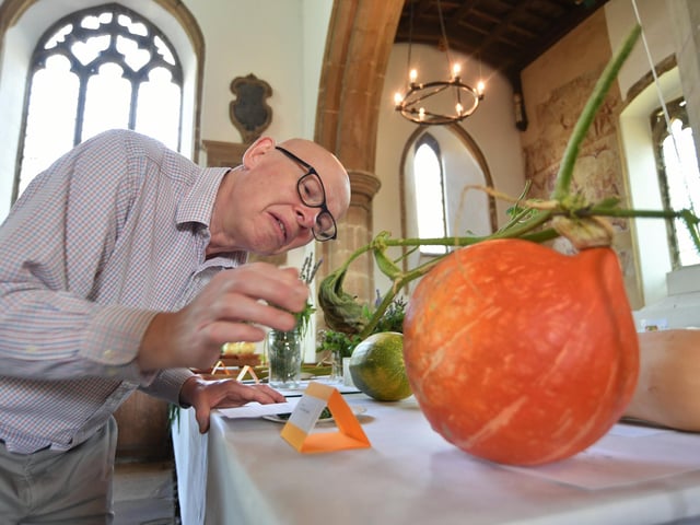 Revd. David Ridgeway looking at exhibits