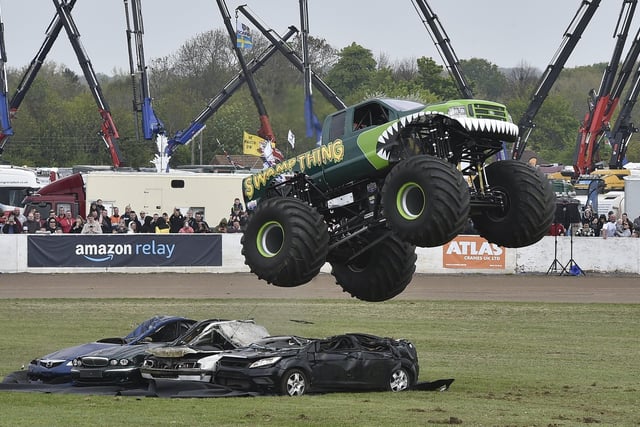 Monster truck car crushing action.