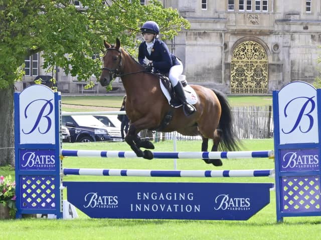 The Le Mieux pony club team jumping  -  Martha Fisher in action