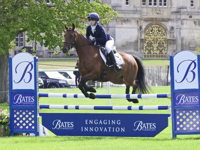 The Le Mieux pony club team jumping  -  Martha Fisher in action