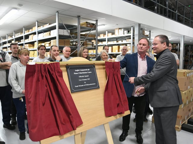 Frank Wolinski,  Regional Vice President of Channel Sales at STMicroelectronics, with John Bowman, managing director of Anglia,  unveil the memorial plaque.
