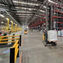 Some of the  powered trucks on 'the motorway' inside the new Amazon centre in Peterborough