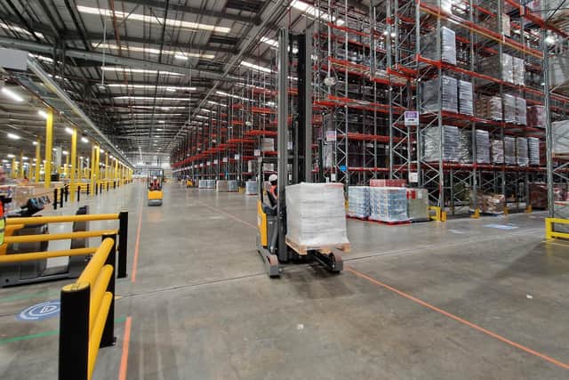 Some of the powered trucks on 'the motorway' inside the new Amazon centre in Peterborough