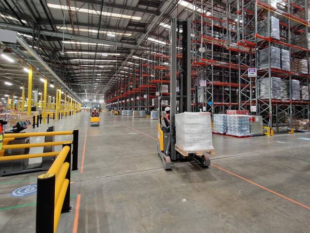 Some of the  powered trucks on 'the motorway' inside the new Amazon centre in Peterborough