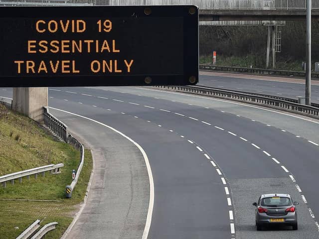 A motorway sign on the M8 advising on essential travel only (Photo: Jeff J Mitchell/Getty Images)