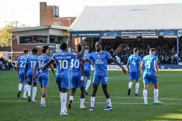Posh celebrate a goal against Cambridge United last season. Photo Joe Dent/theposh.com