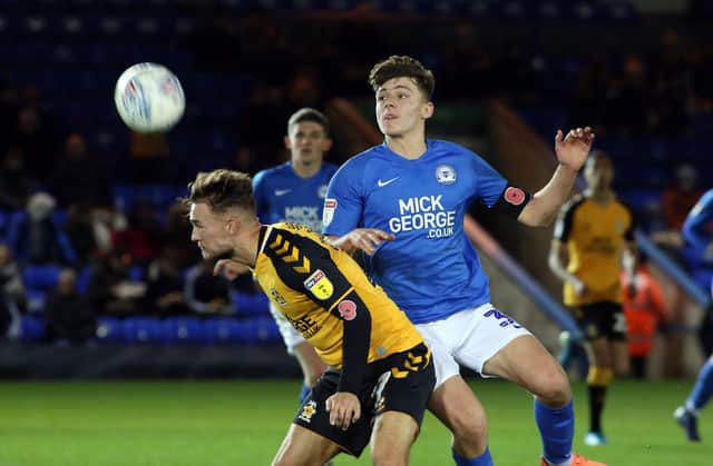 Harrison Burrows of Peterborough United in action against Cambridge United in a 2019 EFL Trophy tie. Photo: Joe Dent/theposh.com.
