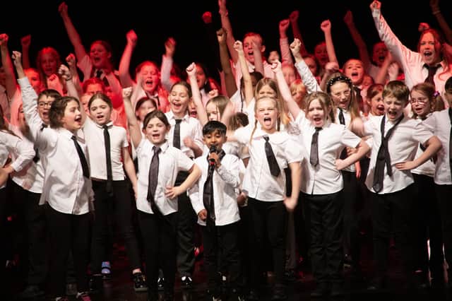 Rising Stars Musical Theatre Group on stage at the New Theatre with Showstoppers