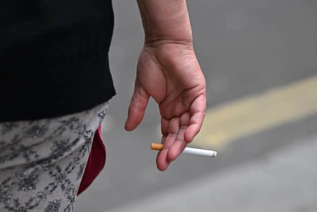 Action is being taken against businesses that did not comply with the law (Photo by JUSTIN TALLIS / AFP) (Photo by JUSTIN TALLIS/AFP via Getty Images)