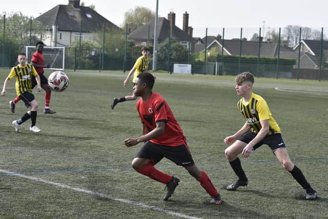 Action from Netherton United Reds v Holbeach United in Division Two of the Peterborough Youth Under 15 Division Two. Photo: David Lowndes.