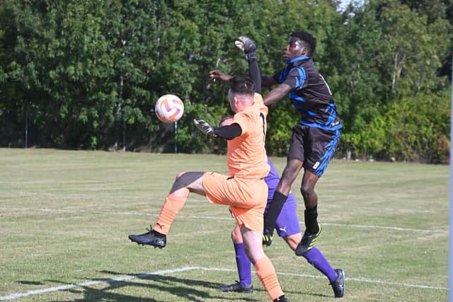 Sunday League action from Stanground Cardea Sports Development (purple) v Peterborough Saints. Photo David Lowndes.