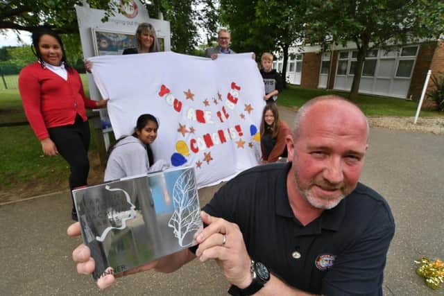 Site manager Matt Sanderson with his award at Highlees Primary School.
