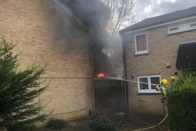 Flames were seen coming from the home. Photo: Heath Purvis
