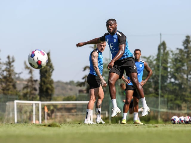 David Ajiboye shoots at goal.