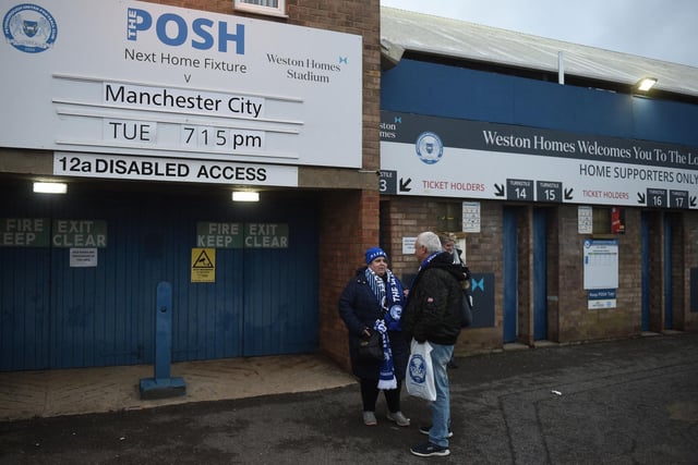 Two supporters arrive early for the mouth-watering FA Cup match against Man City.
