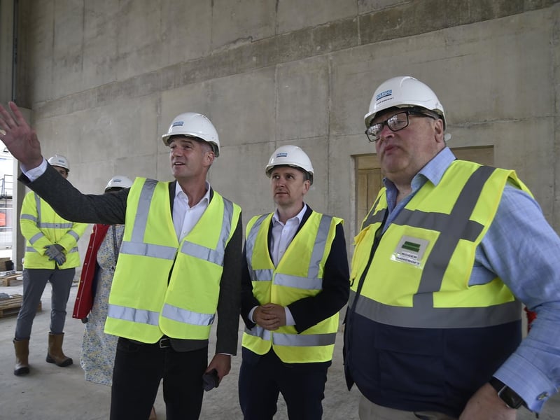 Shadow Secretary of State for Science and Technology Peter Kyle, left, at Peterborough College's Centre for Green Technology, with Andrew Pakes, Labour’s candidate for Peterborough, centre, and the centre's project lead Roger Bancroft, right