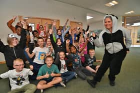 Woodston Primary School teacher Esther Goodwin and her Year 5 class dressed-up as animals to raise money for the WWF at the school's 'Wear it Wild' fundraising day.
