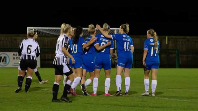 Posh Women celebrate a goal at Notts County. Photo: Ruby Red Photography.