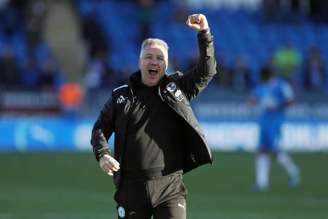 Peterborough United Manager Darren Ferguson celebrates the victory at full-time. Photo: Joe Dent.