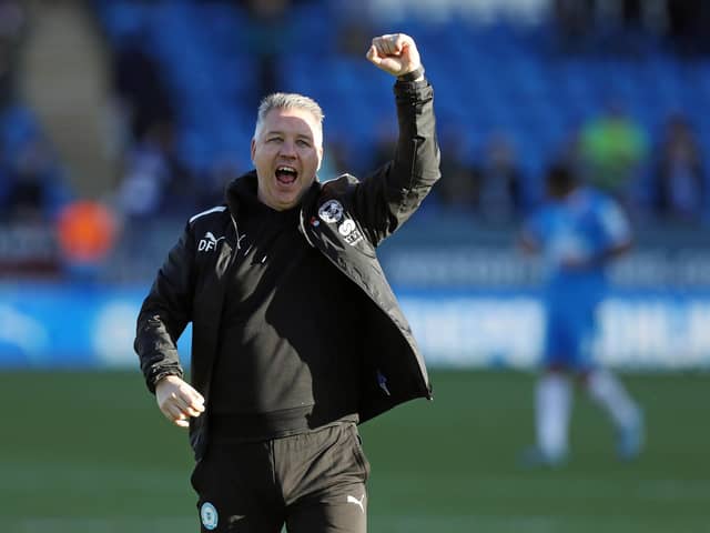 Peterborough United Manager Darren Ferguson celebrates the victory at full-time. Photo: Joe Dent.